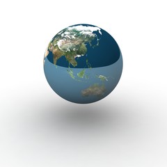 Globe on white background with shadow and reflection