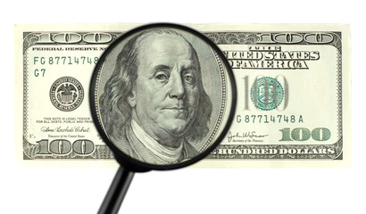 Closeup of $100 banknote - franklin portrait through the magnifi