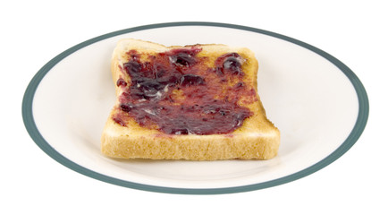 toast with jam on plate isolated on white background