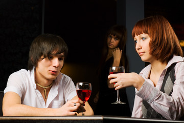 Young couple in a bar.