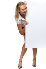Pretty woman holding a blank billboard
