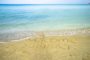 Welcome summer writings on the sand
