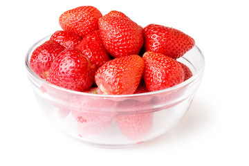 A glass bowl full of fresh strawberries