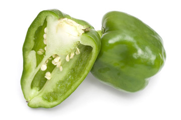 A green bell pepper isolated in white background