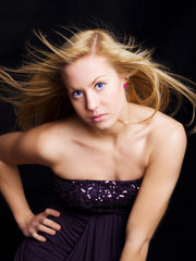 Portrait of a beautiful blond dancing girl