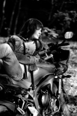 Fototapeta na wymiar The girl and power motorcycle