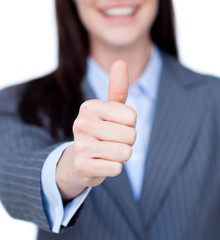 Close-up of a businesswoman with thumb up