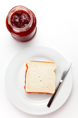 delicious slice of bread with strawberry jam