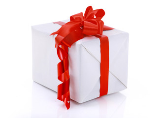 gift box wrapped with red ribbon with big bow isolated.
