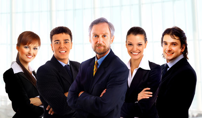 business man and his team isolated over a white background.