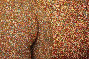 a beautiful womans figure covered in 100s and 1000s.