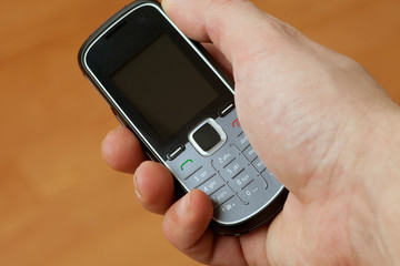 mobile phone in hand