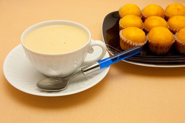 Closeup of coffee with milk in white cup