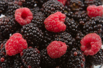 Ripe raspberry and blackberry