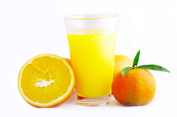 Glass with juice and orange isolated on a white background