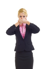 businesswoman in the Speak No Evil pose