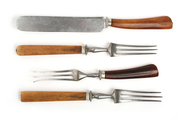antique cutlery, fork and knife on white background