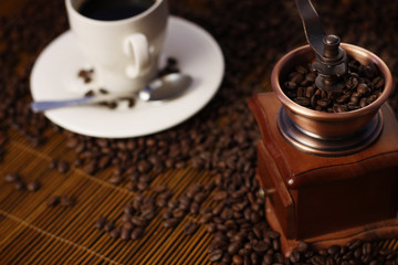 Grinder and Coffee Cup