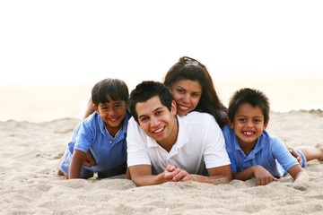 Happy Family Portrait at the Beach