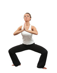 fit brunette practicing yoga