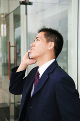 young asian businessman On the office listen to the phone call