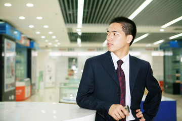 Fototapeta na wymiar young asian businessman in the office