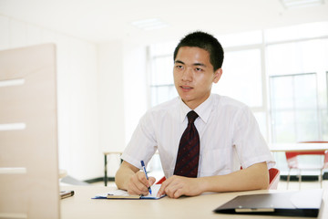 Fototapeta premium young asian businessman in office