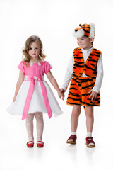 Children in masquerade clothing on isolated background