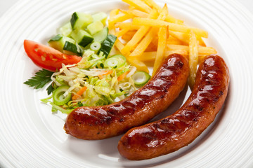 Grilled sausages and vegetables