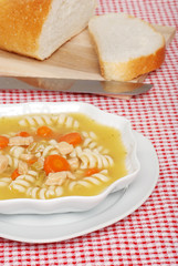 chicken pasta soup with sliced bread