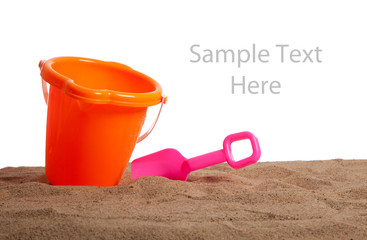 An bucket and shovel on the beach with copy space