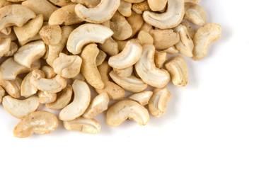 Pile of cashew nuts in isolated white background