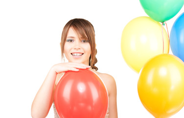 happy teenage girl with balloons