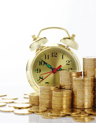 Time is money - clock dial and golden coins