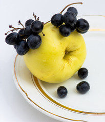 Apple and black grapes