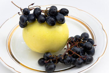 Apple and black grapes