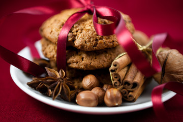 Obraz na płótnie Canvas Homemade christmas cookies with nuts and spices