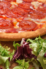 home made italian pizza with salami and cheese