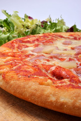 home made italian pizza with salami and cheese