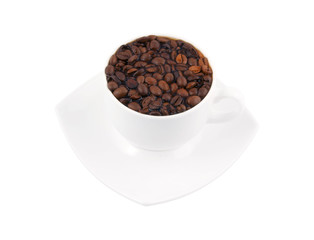 Grains in cup of coffee isolated on white