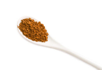 Full spoon of coffee on the white background