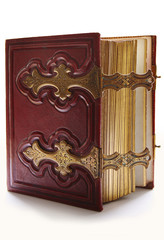 Old dark red antique book, with golden clasp and pages