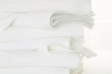 Heimtextilien,Stapel Handtuecher auf weiss