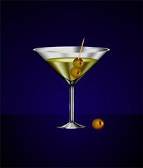 martini glass cocktail with olives