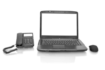 workplace. laptop with telephone