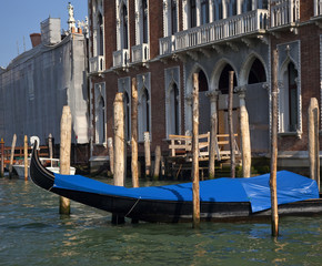 Fototapeta na wymiar Grand Canal Gondola Reflections Mooring Poles Venice Italy