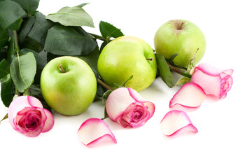 Roses and green apples isolated on white