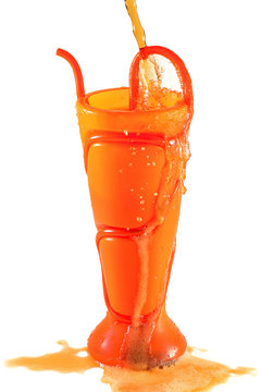 Soft Drink Or Juice Spilling Out Of A Plastic Vase