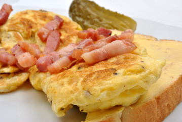 scrambled eggs with organic gherkin and bacon
