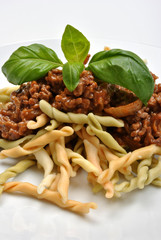 home made pasta with mince sauce and basil